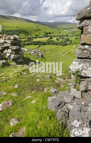 View towards the village of Litton, Littondale, Yorkshire Dales, United Kingdom, with Pen-y-Ghent in the far distance. Stock Photo