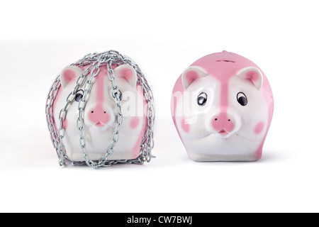 chains and piggy on white. Stock Photo