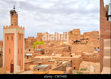 minaret and flat roofs with satellite dishes in the old city, Morocco, Ouarzazate Stock Photo