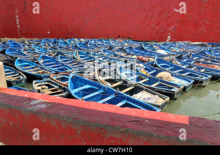 blue fishing boats in harbour, Morocco, Essaouira Stock Photo