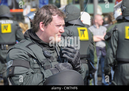 policeman of arrest unit with radio equipment, Germany, Baden-Wuerttemberg Stock Photo