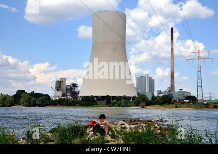 power station Walsum, child playing at Rhine river, Germany, North Rhine-Westphalia, Ruhr Area, Duisburg Stock Photo