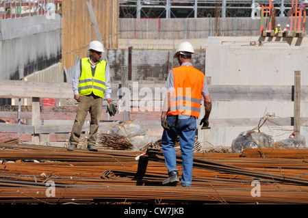 two workers at the construction site of the surgical clinic of the university hospital, Germany, Baden-Wuerttemberg, Ulm Stock Photo
