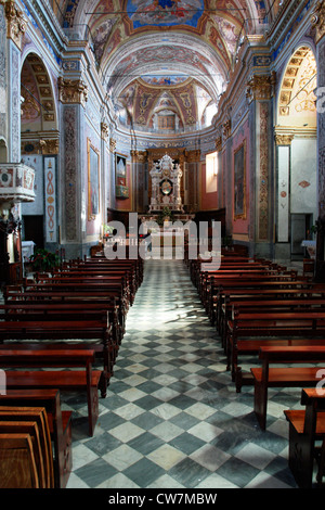 Church in Finalpia: Chiesa abbaziale benedettina 'Nostra Signora Assunta' di Finale Ligure Pia con campanile secolo XII Stock Photo