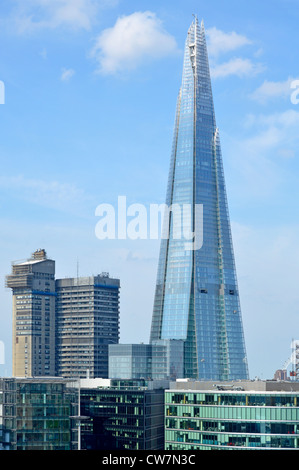 Guys NHS Hospital & The Shard skyscraper landmark building in urban landscape with more london office developments in foreground Southwark England UK Stock Photo