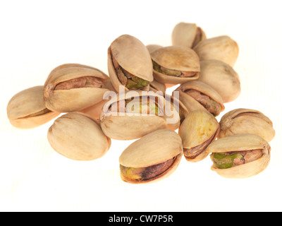 Fresh Roasted Pistachio Nuts In Shells Against A White Background With A Clipping Path And No People Stock Photo