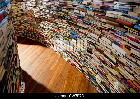 Created by Marcos Saboya and Gualter Pupo, aMAZEme immerses the audience in a labyrinth of books. Stock Photo