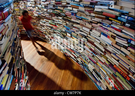 Created by Marcos Saboya and Gualter Pupo, aMAZEme immerses the audience in a labyrinth of books. Stock Photo