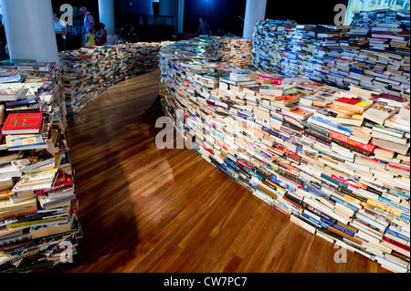 Created by Marcos Saboya and Gualter Pupo, aMAZEme immerses the audience in a labyrinth of books. Stock Photo