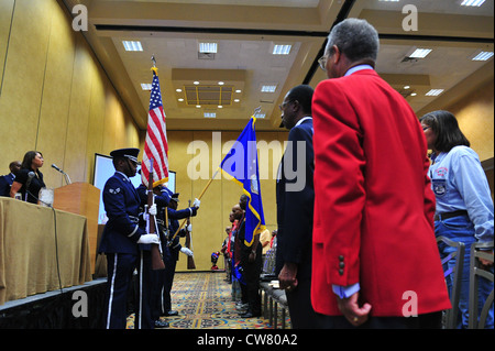 The Nellis Air Force Base Honor Guard present the colors during the Lonely Eagles Ceremony at the 2012 Tuskegee National Convention, Las Vegas, Nev., Aug. 3, 2012. The Lonely Eagles’ Ceremony memorialized Tuskegee air and ground and crews. Stock Photo