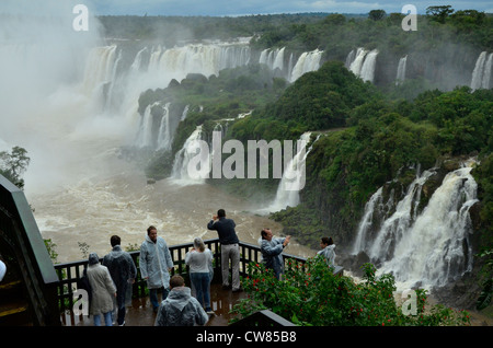 Iguasu Falls in Brazil. One of the biggest waterfalls in the world with many different cascades creating a spectacular scene. Stock Photo