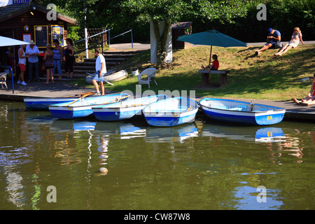 Rowing boats and boat house, Royal Military Canal, Prospect Road, Hythe, Folkestone, Kent, England, UK Stock Photo