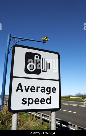 average speed road safety overhead traffic cameras and warning sign scotland uk united kingdom Stock Photo