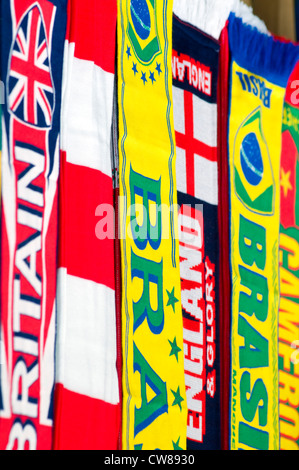 Detail of a selection of colourful football scarves on sale during the London 2012 Olympics football competition Stock Photo