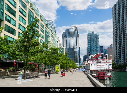 View of downtown skyline from the Harbourfront Centre with Mariposa Cruises to the right, Queens Quay, Toronto, Ontario, Canada Stock Photo