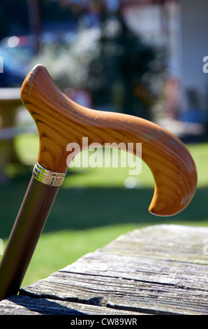 wooden walking stick leaning against the wall Stock Photo - Alamy