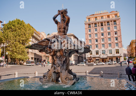 The Fontana del Tritone in Piazza Barberini in Rome, Italy. Stock Photo