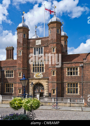 Abbot's Hospital a Jacobean alms house flying the cross of St. George in High Street  Guildford, Surrey, England Stock Photo