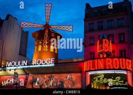 Moulin Rouge, French for Red Mill, is a cabaret in the Pigalle area of Paris, France Stock Photo