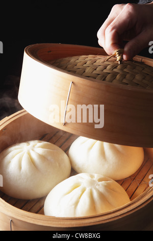 Dumpling In Wooden Container Stock Photo