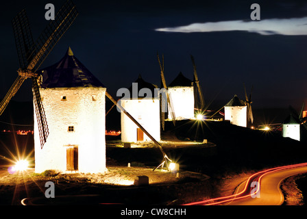 Spain, Castilla-La Mancha: Nocturnal illuminated windmills of Consuegra Stock Photo