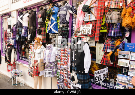 Scottish souvenir shop in Edinburgh, selling tartans, kilts, hats and food. Stock Photo