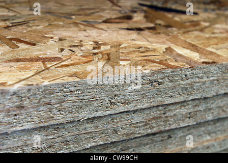 Stack of oriented strand - chip board. Stock Photo