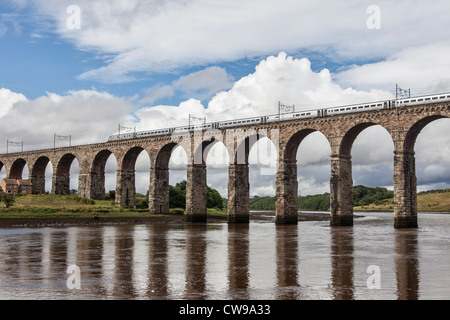 Royal Border Bridge, Berwick-upon-Tweed, designed by Robert Stevenson, carrying an East Coast Main Line train Stock Photo