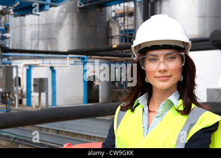 technician working in industrial chemical plant, norfolk, england Stock Photo