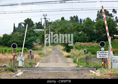 An unmanned level crossing in the South of France Stock Photo