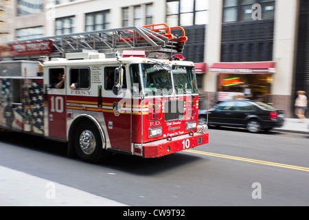 Fire truck on the street of New York City - Engine 10 FDNY - motion blur Stock Photo