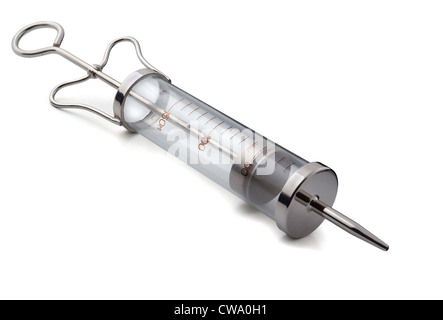 Big empty metal syringe isolated on white Stock Photo