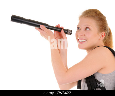 Attractive smiling young woman with telescope on white background Stock Photo