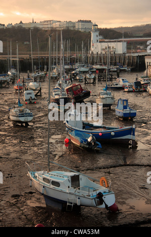 Boats and yachts in Scarborough Harbour at low tide, Scarborough, North Yorkshire,UK Stock Photo