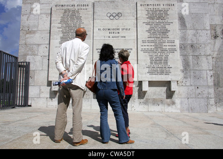 Berlin, tourists in front of the winners board at the Marathon of the Berlin Olympic Stadium Stock Photo