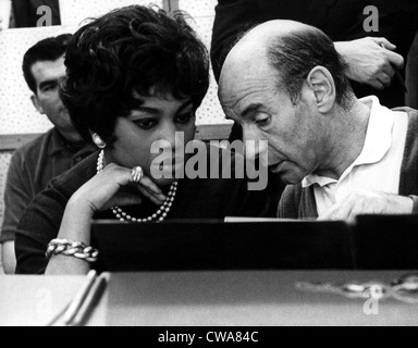 During a Rome recording session for Puccini's MADAME BUTTERFLY, soprano Leontyne Price consults with conductor Erich Leinsdorf. Stock Photo