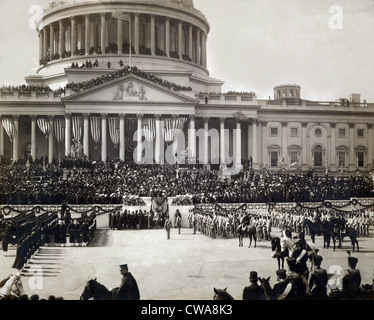 President Roosevelt taking the oath of office, Mar. 4 1905.  The east portico of the U.S. Capitol is decorated with flags and Stock Photo