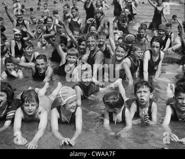 Crowd of children, boys and girls, having fun at Washington, D.C. beach in 1923.