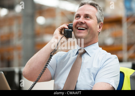 Warehouse manager on the phone Stock Photo