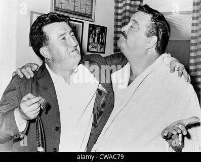 Brendan Behan (1923-1964), Irish author with actor Jackie Gleason (1916-1987).  Behan's play, 'The Hostage,' was playing on Stock Photo