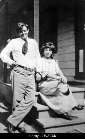 Jack London (1876-1916), American author with his second wife, Charmian Kittredge, seated on a porch, 1914. Stock Photo