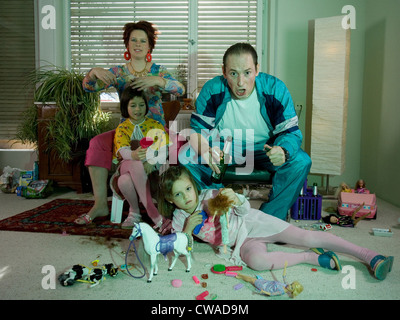 Riedlingen, a family sitting in front of the television and watch Football Stock Photo