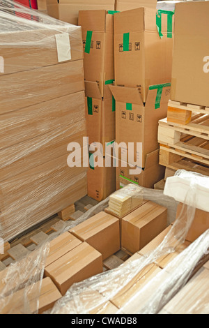 Cardboard boxes in warehouse Stock Photo