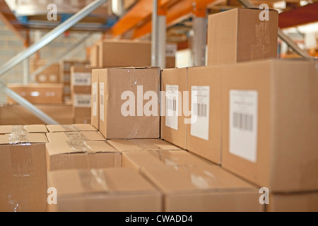 Cardboard boxes in warehouse Stock Photo