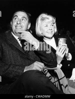 Doris Day and husband Martin Melcher (left) attending an exhibition basketball game between the Los Angeles Lakers and Stock Photo