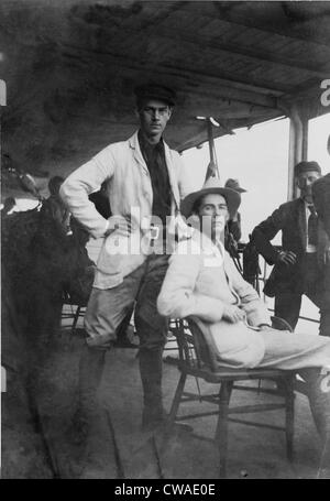 Richard Harding Davis (1864-1916) with other newspaper correspondents lounging on deck of steamer during the Spanish-American Stock Photo