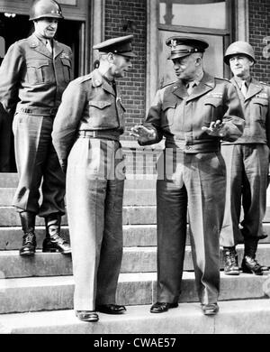 Lt. General Omar N. Bradley, King George VI, General Dwight D. Eisenhower and Lt. General Courtney Hodges, during the king's Stock Photo