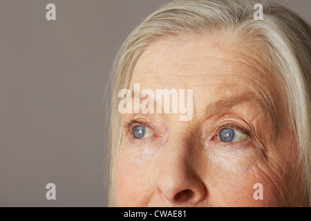 Senior woman looking away Stock Photo