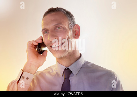 Businessman using cellphone Stock Photo