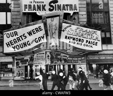 Sailors attacking the image of teen idol Frank Sinatra at the Paramount Theatre in New York, 1944. Courtesy: CSU Archives / Stock Photo